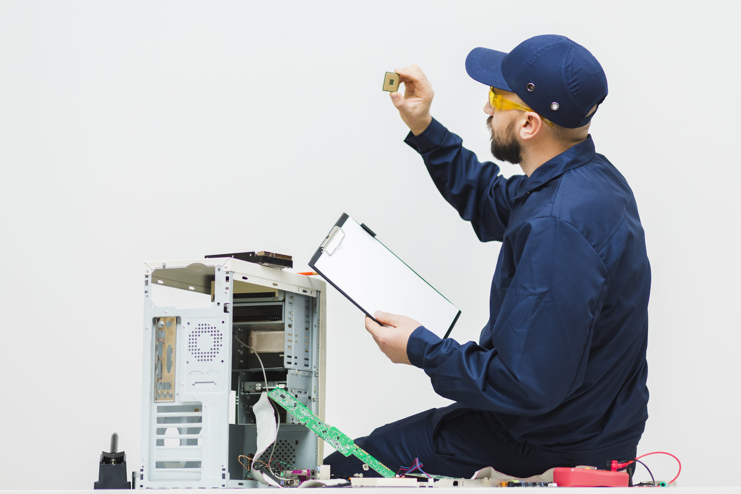 sideways-man-repairing-computer